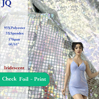 Tissu en tricot extensible respirant et résistant aux taches, à motif mosaïque bronzé sur fond vert, idéal pour les tenues de scène, les maillots de bain et les robes.