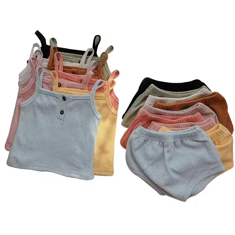 Conjunto de duas peças de roupas de verão para meninas, com waffle, moda infantil, colete suspensor elegante, shorts de verão, novidade em 2024