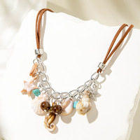 Nouveauté en gros : Colliers bohèmes coquillages et conques, style vacances à la plage, chaînes de clavicule et accessoires assortis pour les voyages.