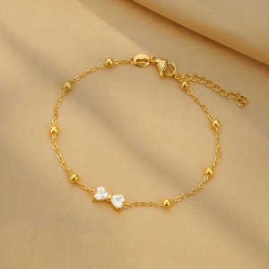 Pulsera minimalista <span class=keywords><strong>de</strong></span> acero inoxidable chapada en <span class=keywords><strong>oro</strong></span> <span class=keywords><strong>de</strong></span> 18K sin deslustre, pulsera con abalorio <span class=keywords><strong>de</strong></span> cuentas <span class=keywords><strong>de</strong></span> lazo <span class=keywords><strong>de</strong></span> circón blanco a la moda <span class=keywords><strong>para</strong></span> mujeres y <span class=keywords><strong>niñas</strong></span> - Product Image 1