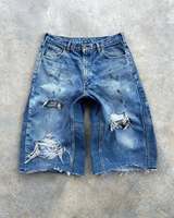 Pantalones Cortos de Mezclilla Vintage Lavados y Desgastados, Estilo Carpenter, con Costuras Reforzadas, Holgados, con Bajo Deshilachado y Manchas de Pintura, Venta al por Mayor