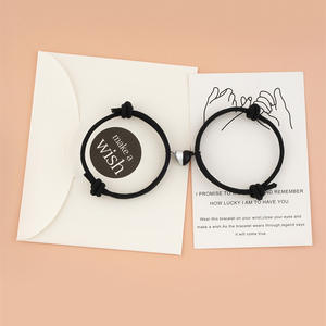 Braccialetto di coppia intrecciato di moda a forma di cuore magnetico a forma di cuore in bianco e nero regolabile - Product Image 4