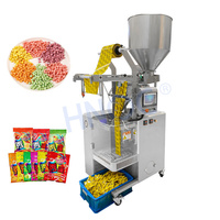 Produit en granulés HNOC Paquet en sachet de 50g Paquet de sachet de chocolat Double sachet de supplément Petite machine de remplissage de gomme