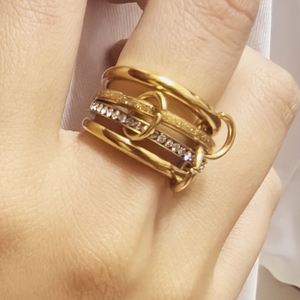 Bague en acier inoxydable anti-ternissement, zircone multicouche, bicolore, à maillons entrelacés, style éternité, anti-anxiété - Product Image 6
