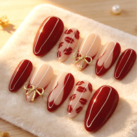Faux ongles à presser rouge bordeaux, forme amande moyenne, avec motif lèvres et nœud doré, pour femmes, pour la Saint-Valentin, le quotidien et les soirées