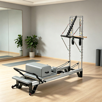 Reformer Pilates avec tour en acier inoxydable, cadre en aluminium réglable et durable pour l'entraînement en studio