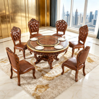 Ensemble de table à manger ronde en bois massif de style vintage européen avec plateau tournant et chaises en cuir PU sculptées à la main, mobilier de salle à manger en gros