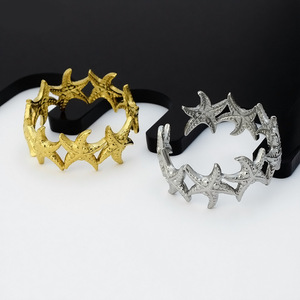 Bague unisexe en acier inoxydable motif étoile de mer, design de niche style vacances océaniques 2026, luxe léger, bijoux de mode, vente en gros - Product Image 4