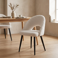 Chaises de salle à manger légères et luxueuses pour hôtels, chambres, restaurants et cafés, avec un tissu contemporain et un coussin doux et décontracté.
