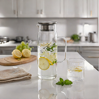 Carafe en verre borosilicate écologique de 1,5 L avec couvercle en acier inoxydable et poignée en verre, résistante à la chaleur, pour boissons chaudes/froides et thé glacé
