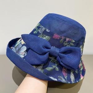 หมวกทรงบักเก็ตประดับโบว์ลายดอกไม้สำหรับผู้หญิง หมวกปีกกว้างกันแดดสไตล์เกาหลี พับเก็บได้ ทำจากผ้าฝ้ายและผ้าลินิน - Product Image 3