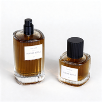 Bouteille de parfum en verre transparent de 50ml 100ml Vaporisateur de parfum carré à rayures verticales Boîte LOGO personnalisable