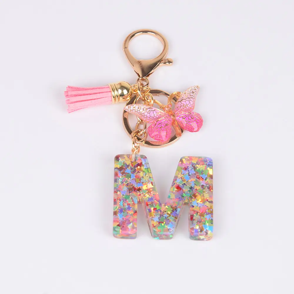 Wholesale new fashion key chain acrylic color sequin English letter pendant butterfly fringe metal key chain