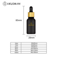 Flacons compte-gouttes pour huiles essentielles en verre noir élégant avec boîtes cylindriques personnalisées, flacons compte-gouttes pour huiles essentielles de plusieurs tailles