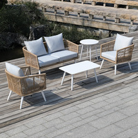 Salon de jardin extérieur, ensemble de canapé 4 places en fer forgé tressé de style nordique, chaises en métal, canapé de patio inspiré des designers, table à thé