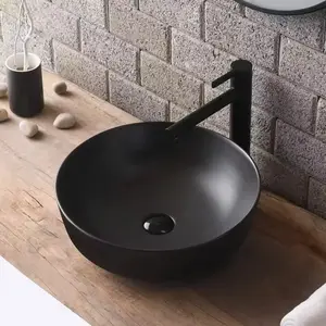 Wastafel kamar mandi bulat hitam Matte, wastafel kamar mandi keramik berwarna-warni untuk wastafel lavabo