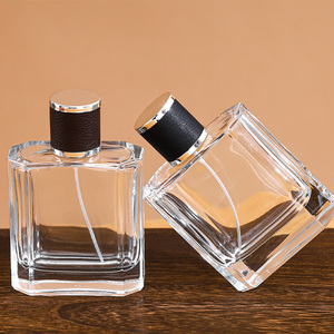 Venta al por mayor 100mL biselado plano cuadrado espesar Base botella <span class=keywords><strong>de</strong></span> perfume <span class=keywords><strong>de</strong></span> vidrio transparente con <span class=keywords><strong>tapa</strong></span> <span class=keywords><strong>de</strong></span> cuero - Product Image 1