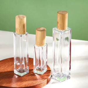 Botella Recargable de Perfume Cuadrada Ecológica de 30ml 50ml 100ml con Pulverizador de Madera - Product Image 1