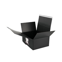 Boîte d'expédition en carton ondulé noir personnalisée avec bande de déchirement, rabats entièrement superposés et impression de logo couleur pour l'e-commerce