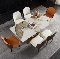 Ensemble de table à manger ovale en acier inoxydable haut de gamme avec 6 chaises modernes en marbre pour meubles de maison