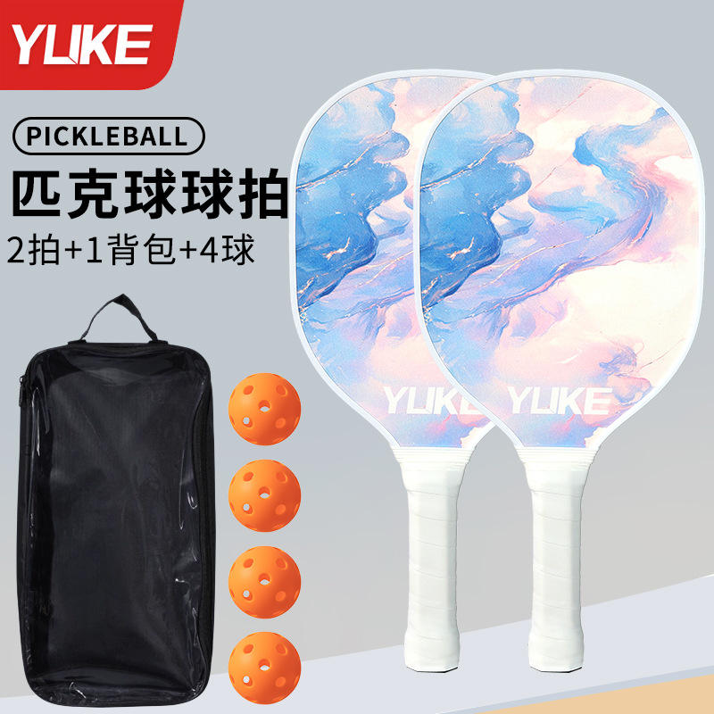 Sac cadeau bleu et violet doré avec 4 boules creuses.