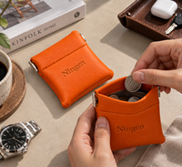 Étui mini-porte-monnaie en cuir PU orange avec fermoir à pression, petit étui pour écouteurs, logo personnalisé en relief, pour femmes, rangement de pièces de monnaie, vente en gros