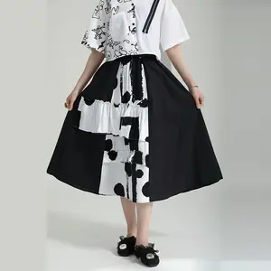 半身裙女性个性印花不规则a字裤女孩夏季2023利基设计圆点对比日本中长裙