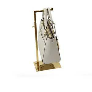 Factory custom adjustable height golden bags shop counter metal stainless steel bag display holder metal handbag display rack