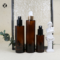 Vente en gros de flacon pulvérisateur en verre cylindrique noir ambré blanc plat de 60ml 100ml 120ml avec bouchon de pompe en plastique blanc