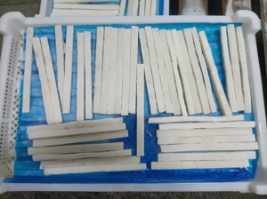 Lieferant für Gefrorene Tintenfischscheiben, Hautlose IQF-Produkte, Hersteller von Dosidigus Gigas, Fabrik für Riesentintenfischstreifen ohne Haut - Product Image 2