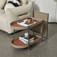 Table d'appoint mobile en cuir avec rangement, style luxe léger, pour salon, en acier inoxydable, petite table basse