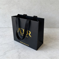 Sac en papier de luxe écologique couleur personnalisée avec estampage à chaud doré et poignée en ruban pour emballage cadeau de mariage, artisanat et bougies