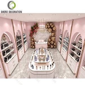 Étagères de présentation cosmétiques en or rose de luxe, design d'intérieur de parfumerie, aménagement de boutique de cosmétiques bio, vitrine arquée - Product Image 3