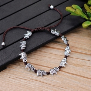 Vente en gros de bracelets en alliage plaqué argent thaïlandais antique avec cœur d'éléphant tissé à la main pour hommes et femmes - Product Image 2