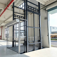 Monte-charge hydraulique vertical intérieur personnalisable, machine de levage de matériaux robuste pour entrepôt et atelier de fabrication