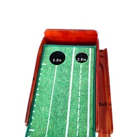Entraîneur de putter de golf portable avec système de simulation retour automatique des balles praticien mettant le dos en caoutchouc vert