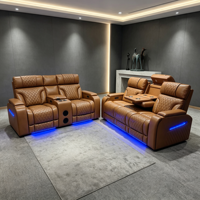Ensemble de canapés inclinables électriques en cuir de luxe pour home cinéma avec porte-gobelets, éclairage d'ambiance et rangement pour salon