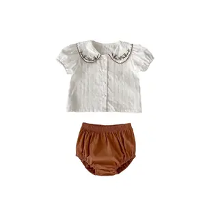 2024 ग्रीष्मकालीन छोटी आस्तीन वाले बच्चों के लिए बेबी गर्ल्स कढ़ाई वाली गुड़िया कॉलर ब्लाउज + पैंट 2 सेट