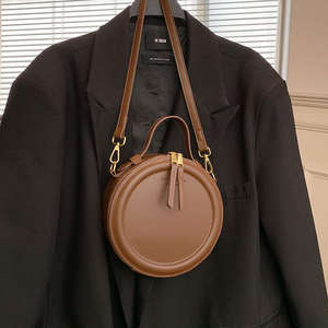 Sac à main rond simple et portable de style rétro européen et américain, à bandoulière unique - Product Image 1