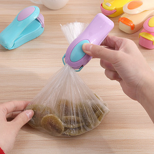Portable mini sealing machine, food plastic <b>bag</b> sealing machine, household <b>small</b> hand-operated heat sealing machine, wholesale. - Product Image 1