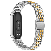 Correa de Reloj de Acero Inoxidable con Hebilla de Eslinga y Siete Cuentas para Xiaomi Band 10 / 10NFC / 9 / 9NFC / 8 / 8NFC