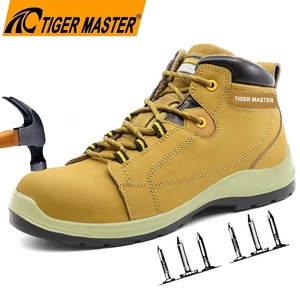 Botas de seguridad de cuero de vaca <span class=keywords><strong>amarillo</strong></span> antiestáticas antideslizantes resistentes al aceite de la marca Tiger Master para evitar pinchazos con punta de fibra de vidrio - Product Image 1