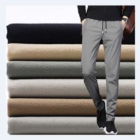 Pantalons pour hommes en nylon spandex du fabricant de l'usine OEM ODM Lot de tissu extensible dans les 4 sens style tissé respirant et uni en stock