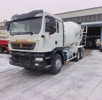 Camion malaxeur à béton haute performance Sinotruk Howo TX 12CBM 6x4 400HP avec système hydraulique complet et pompe à chargement automatique à vendre