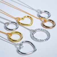 Vente chaude chine anneau galvanoplastie magicien métal jouet anneau chaîne facile collier tour de magie logique noeud infini anneau pour enfants
