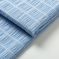 Tissu jacquard texturé à bulles, teint en fil, personnalisé, 76 % polyester, 10 % rayonne, 14 % lyocell, idéal pour les vêtements féminins