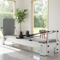 Machine de Pilates Reformer en bois de chêne avec revêtement en poudre, équipement d'entraînement de Pilates, système d'entraînement de Pilates pour la maison, la salle de sport et le studio