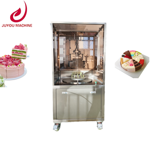 Machine entièrement automatique multifonctionnelle pour la découpe, la tranchage et l'insertion de papier dans les gâteaux mousse surgelés - Product Image 1