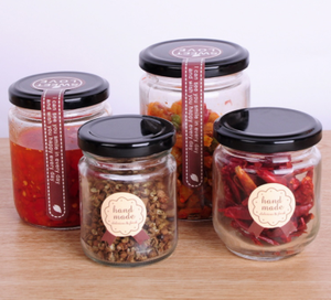 Petits pots à <span class=keywords><strong>confiture</strong></span> ronds en verre de 45ml 75ml 100ml 150ml bon marché avec couvercles dorés récipients en verre pour le miel - Product Image 1
