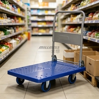Chariot à plateforme en plastique robuste à quatre roues pour la manutention manuelle des marchandises dans les installations industrielles